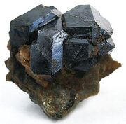 File:180px-450px-Uraninite-usa32abg.jpg